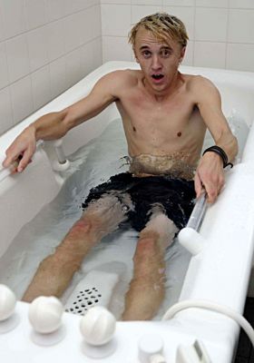 Tom Felton takes cold bath
Tom taking a cold muscle bath after practicing for SoccerAid 2008.
Keywords: tom, felton, bath, socceraid