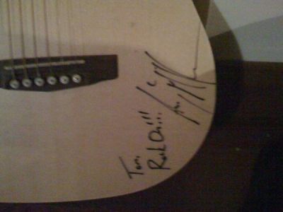 Tom's guitar
Signed by Andy McKee
