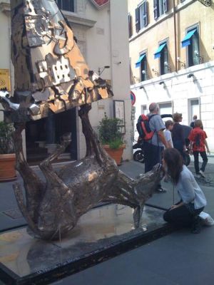 Jade kissing a donkey
upside down in Rome, Italy

