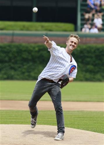 first pitch before a baseball game between the Houston Astros and the Chicago Cubs
